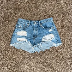 Levi’s 501 distressed high waisted jean shorts